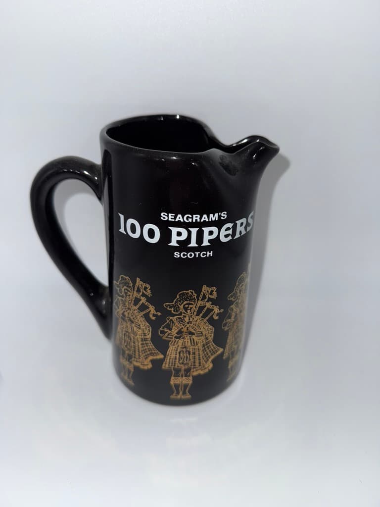 Vintage 100 Pipers Scotch Black Ceramic Pitcher
